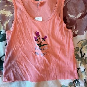 Urban outfitters; never worn- pink forget me not flower cropped tank